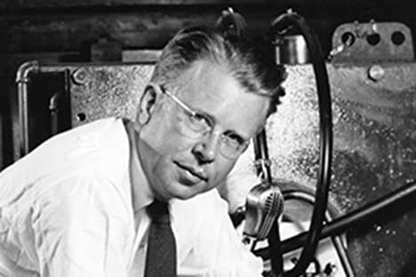 Historic black and white photo of Ernest Lawrence wearing glasses and tie.