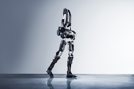 Robotic exoskeleton standing on empty room