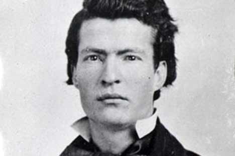 Historic black and white photo of Mark Twain as a young man.
