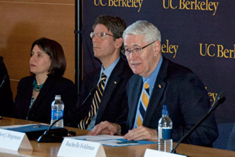 Chancellor and two other administrators at a press conference with the UC Berkeley backdrop