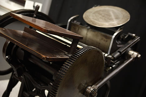 printing press with visible gears